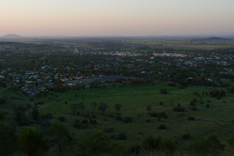 Distant view of a township and surrounding area.