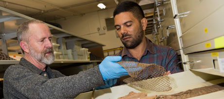 david-kaus-homepage.jpg Curator David Kaus and visiting Kokoberrin artist Shaun Edwards, from far north Queensland, examine a piece of fibre work at the Museum's Indigenous collections store.