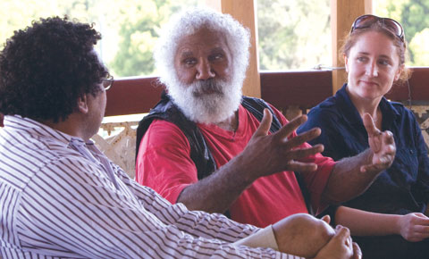 Martin Ballangarry sits speaking to Troy Pickwick and Kipley Nink.