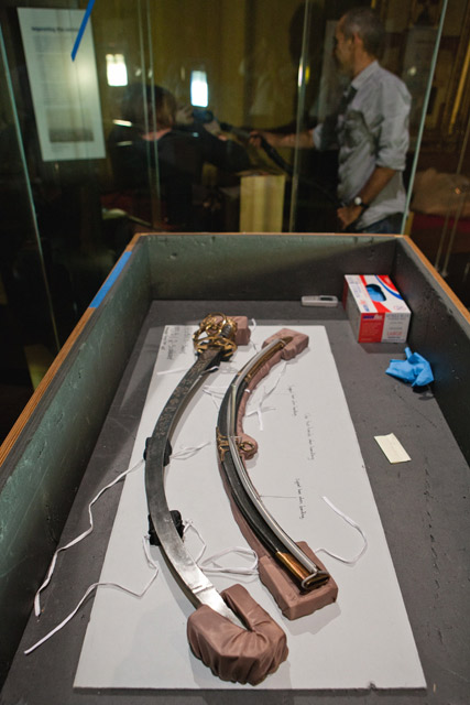 Installing Governor Lachlan Macquarie's sword in the Landmarks gallery.