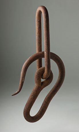 Rusted metal hook.