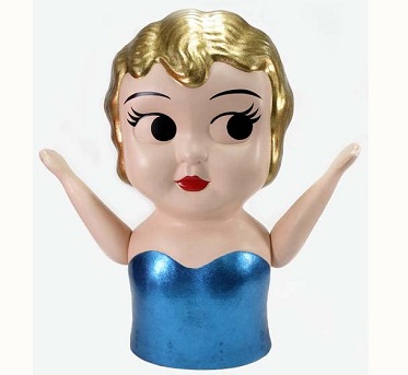 Head and torso of a doll wearing a painted blue dress.