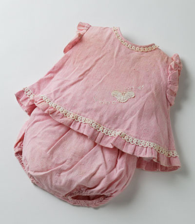 Small pink top with matching pants.