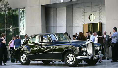 Sir Robert Menzies' Bentley car and spectators in a courtyard at Parliament House, Canberra, October 2006.