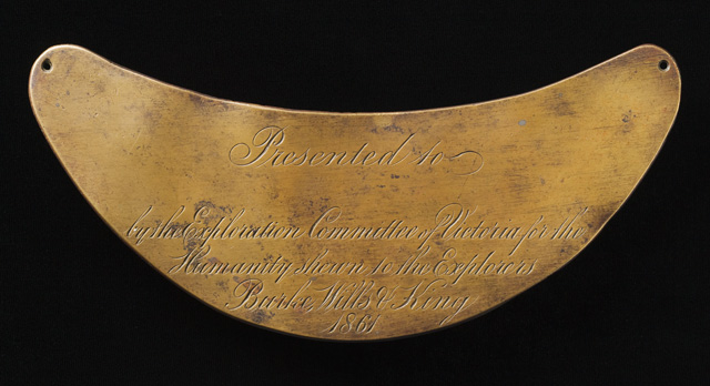 A breastplate inscribed with the word 'Presented to ... by the Exploration Committee of Victoria for the Humanity shewn to the Explorers Burke, Wills & King 1861'