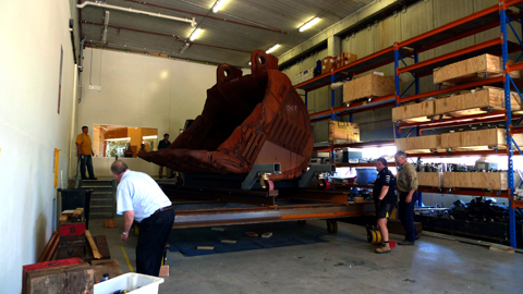 The rock bucket sitting on top of the temporary platform.