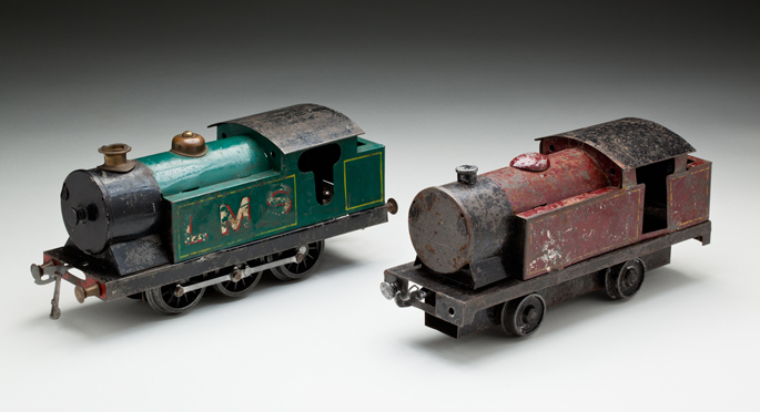 (l-r) Electrically driven and push along locomotives made with pressed and cast metals by Eric Hallmen in about 1945.