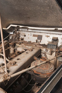 A photograph of the engine of an historic motor vehicle.