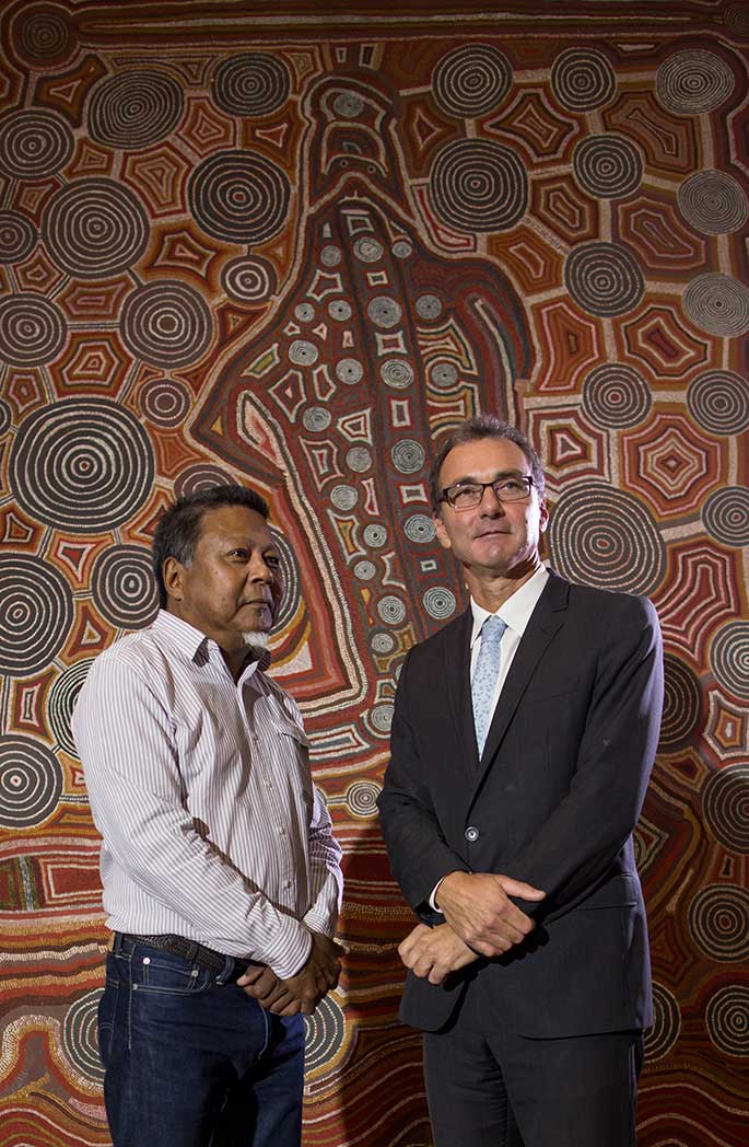 Standing in front of Uta Uta Tjangala’s 1981 masterpiece, Yumari, are Council member and Indigenous Reference Group chairman, Peter Yu, with Museum Director, Dr Mathew Trinca, at the launch of the British Museum partnership