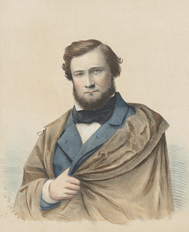 Colour image of bearded man wearing cloak concealing his missing left arm.
