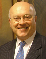 Senator the Hon George Brandis SC.