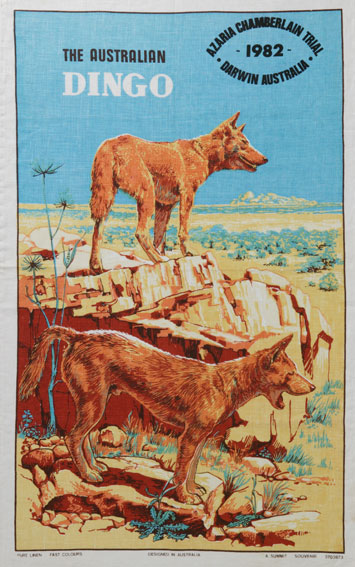 Tea-towel showing two dingoes near Uluru, with text 'The Australian Dingo, Azaria Chamberlain Trial, Darwin Australia, 1982.
