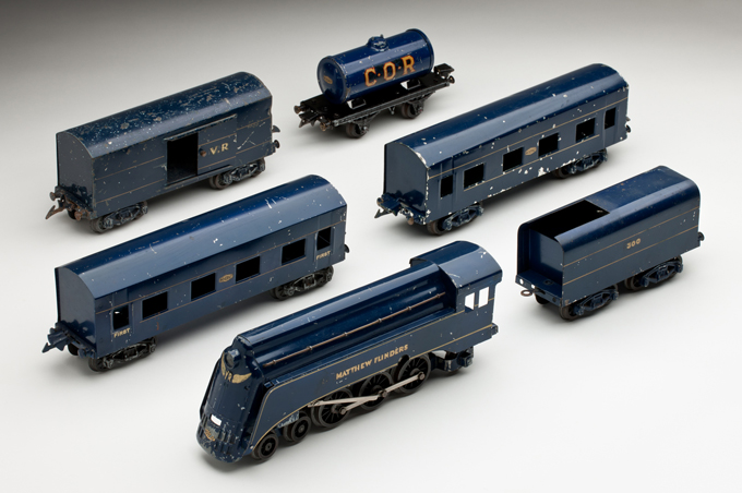 Victorian Railways ‘Matthew Flinders’ Spirit of Progress locomotive with tender, passenger cars and freight wagons, made with pressed and cast metals by Ron Titchener and associates