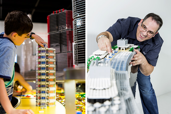 A man and a boy building towers with LEGO bricks.On the left is boy