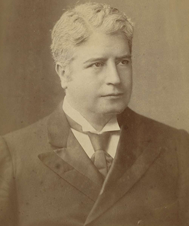 studio photo portrait of head and shoulders of middle aged man
