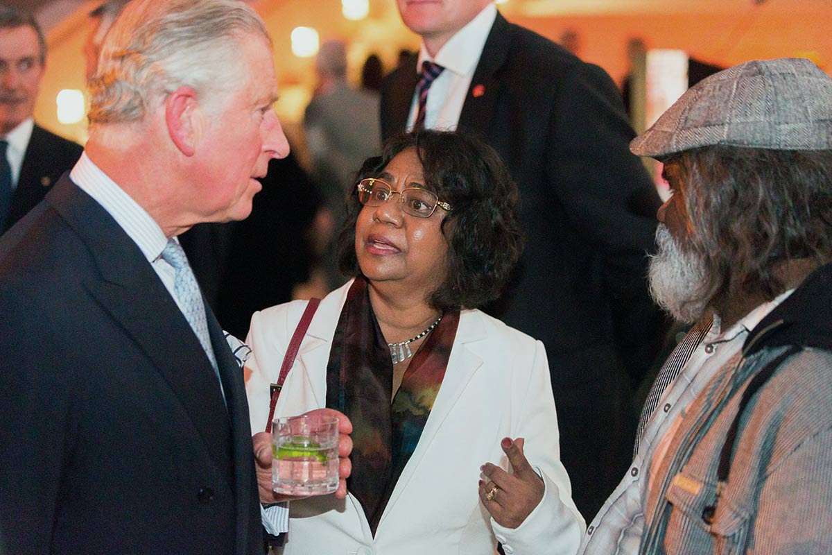 HRH Prince Charles speaking with two Indigenous people - click to view larger image