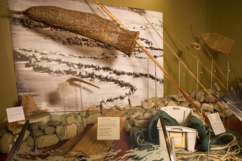First Australians display featuring fishing equipment.