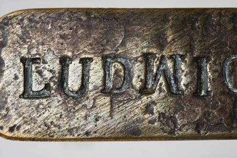 Close up image of the 'LUDWI' lettering on the Leichhardt nameplate.