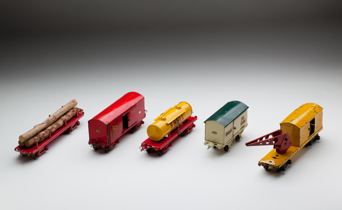 (l-r) Victorian Railways timber wagon, large goods van, tank wagon, small goods van and crane wagon, made from sheet steel and cast metal components by Ron Titchener and associates