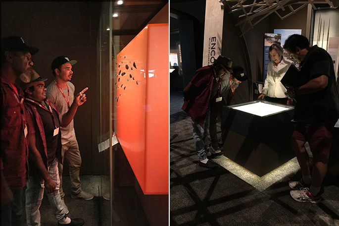 Image compile showing three men looking at an illuminated display; and a woman and three men looking down at a display case.