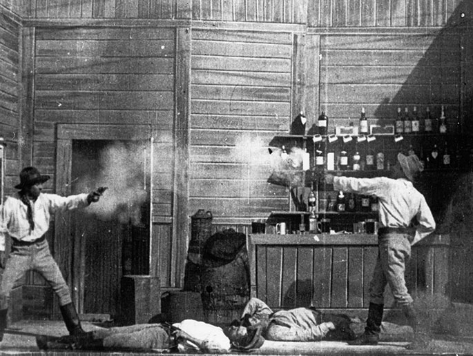 A shooting duel scene from an old black and white movie