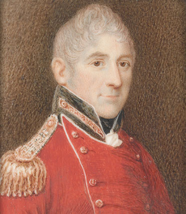 three-quarter profile portrait painting of smiling middle-aged man with grey, curly hair wearing the dress uniform of a senior army officer – red tunic with black collar and gold epaulettes.