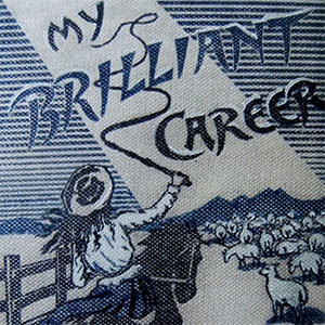 Cover shows illustration of a woman on a horseback charging towards flock of sheep cracking a whip. The title is included but not the author.
