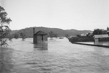 a black and white photo of an outdoor flood scene
