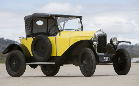 Yellow Citroen car with black hood