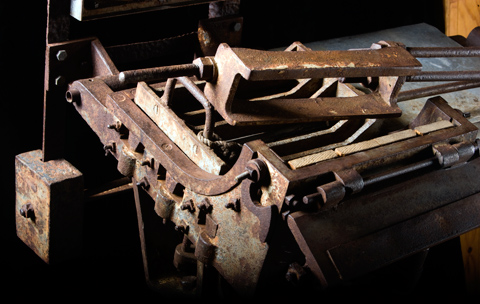 Detail of a knitlock brick-making machine