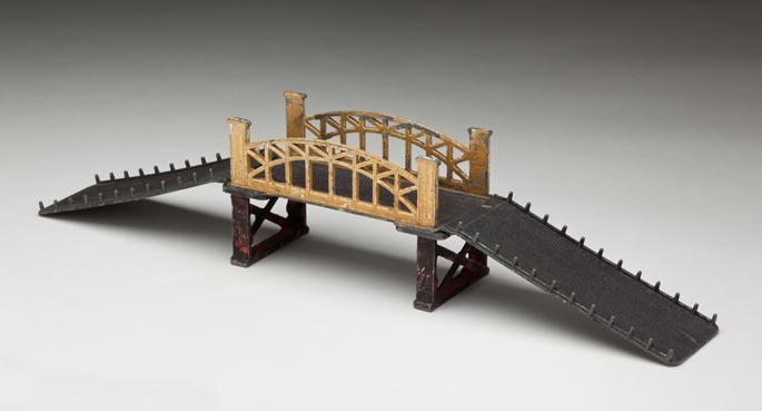 Solid metal road bridge with side ramps made by F W Strong and associates of Melbourne