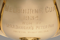 An 18ct gold, three-handled cup style trophy