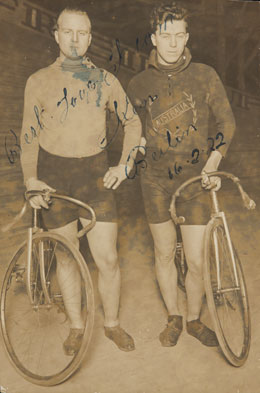 Will Spencer and Ken Ross standing beside their bicyclies