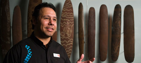 lee-burgess-homepage.jpg Curator and repatriation officer Lee Burgess talking about the wooden shields in the Museum's Open collections area.