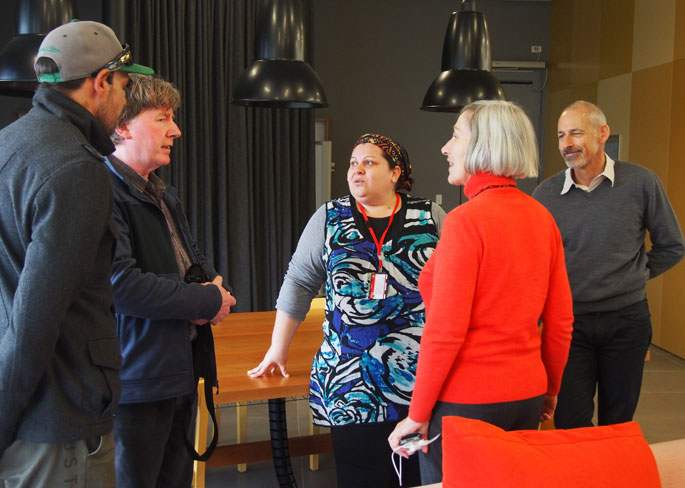 Two men and two women having a converation.