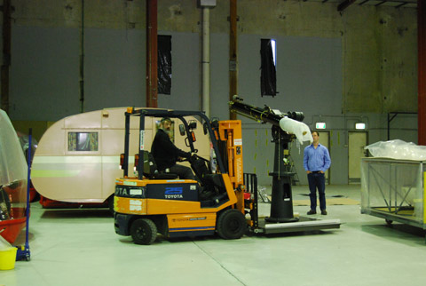 Conservation staff move the telescope.