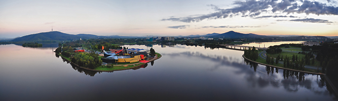 Aerial view of the National Museum of Australia on Acton Peninsula, surrounded by Lake Burley Griffin. Photograph by Greg Primmer