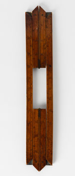 Folded wooden frame with brass hinges.