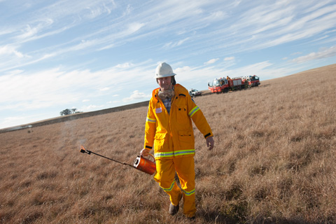 John Reynolds, President of the Gundary Rural Fire Brigade begins the burn.