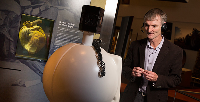 Robert Bunzli with a Museum robot.