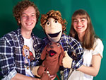 puppets Two people holding puppets