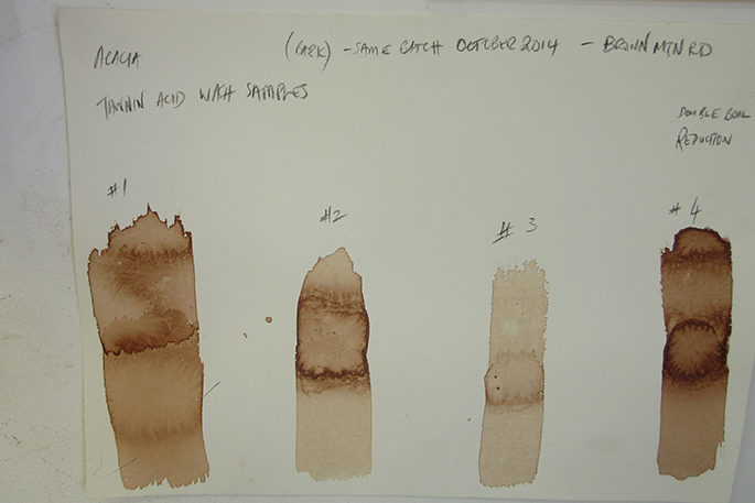 An artwork with a series of vertical brown stripes.