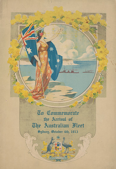 Woman standing on the south headland of Sydney Harbour watching the arrival of the Australian naval fleet. The woman is holding an Australian flag and is framed by a circular border surrounded by wattle. Printed text at bottom reads 'To Commemorate / the Arrival of / The Australian Fleet / Sydney, October 4th, 1913'. The Australian coat of arms is printed below.