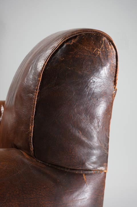 The shoulder of the chair after conservation treatment.