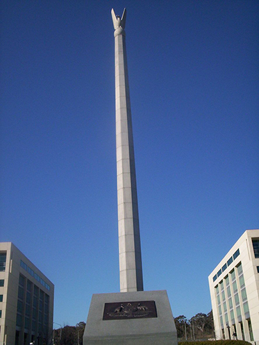 High tapering column topped with stylised eagle.