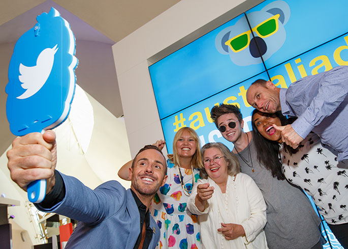 A group of people posing for a photograph.