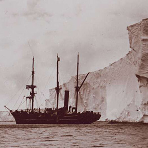 ship spotted through hole in glacial ice