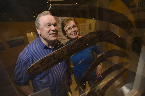 Visitors viewing boomerangs in the New South Wales display.