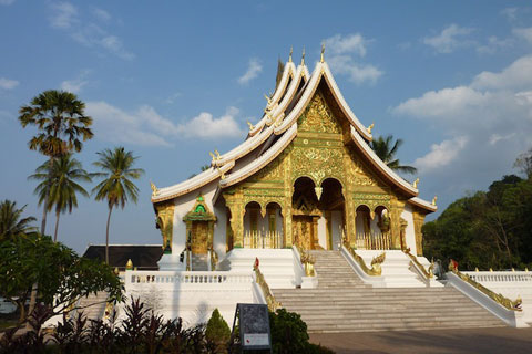 A beautiful building with ornate gold-greenish coloured facade.