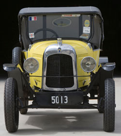 Front view of yellow and black Citroen car.